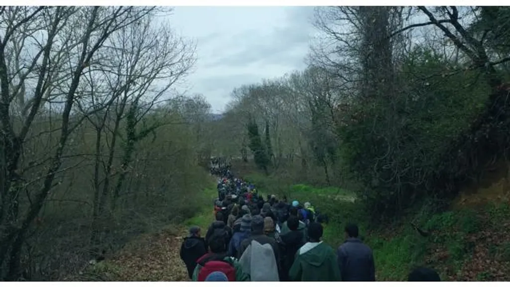 Human-Flow_Still_2016_03_14_walking-Refugees_near_Idomeni-Camp_Greece.jpg