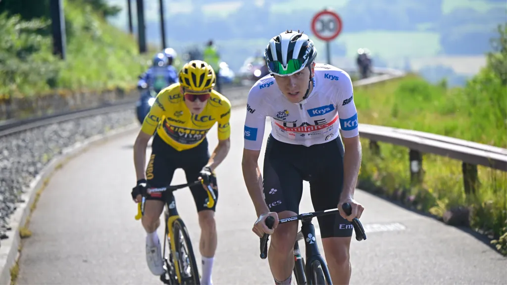   Tadej Pogacar of Slovenia and UAE Team Emirates - White Best Young Rider Jersey attacks to Jonas Vingegaard of Denmark and Team Jumbo-Visma