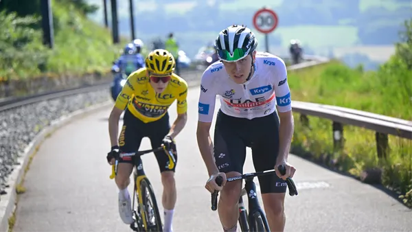   Tadej Pogacar of Slovenia and UAE Team Emirates - White Best Young Rider Jersey attacks to Jonas Vingegaard of Denmark and Team Jumbo-Visma