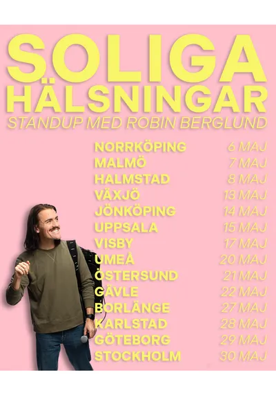 Robin Berglund står framför en lista över turnédatum