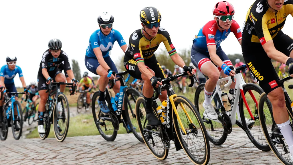 (L-R) Marianne Vos and Marta Lach compete through cobblestones during the 1st Paris-Roubaix Femmes 2021 (Photo by Bas Czerwinski:Getty Images).jpg