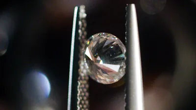 Ep 4. World’s Biggest Diamond Raid. Antwerp. Diamond being held with a tweezer.