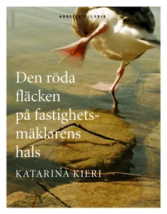Den röda fläcken på fastighetsmäklarens hals